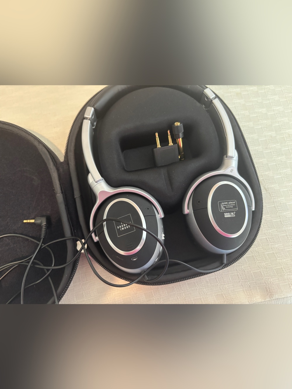 The Sharper Image Quiet Place Noise Cancelling Wired Headphones in Case